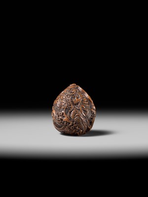 Lot 334 - TORYUSAI KOZAN: A SUPERB KURUMI (WALNUT) NETSUKE OF A DRAGON, DATED 1848
