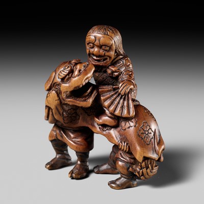 Lot 485 - SOMIN: A FINE WOOD NETSUKE OF THREE SHISHIMAI DANCERS