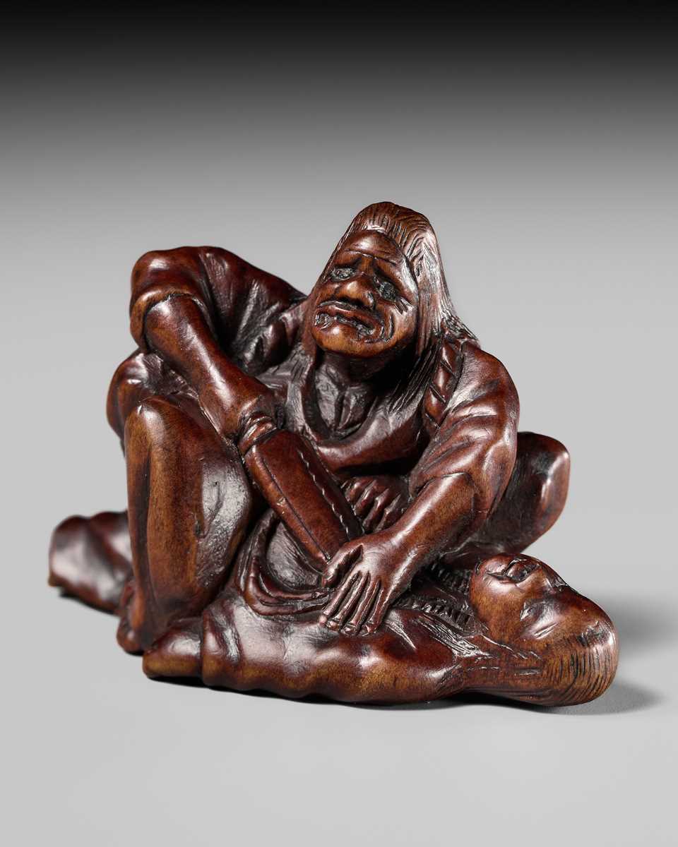 Lot 378 - KORAKUSAI: A RARE EDO SCHOOL WOOD NETSUKE OF