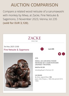 Lot 219 - MIWA: AN AMUSING WOOD NETSUKE OF A SARUMAWASHI WITH MONKEY