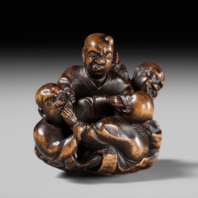 Lot 228 - HOSHUNSAI MASAYUKI: A WOOD NETSUKE OF FIVE FIGHTING BLIND MEN