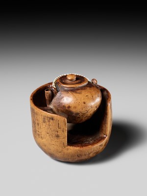 Lot 471 - MASAKAZU: A WOOD NETSUKE OF A TETSUBIN ON A HIBACHI