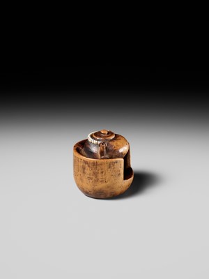 Lot 471 - MASAKAZU: A WOOD NETSUKE OF A TETSUBIN ON A HIBACHI