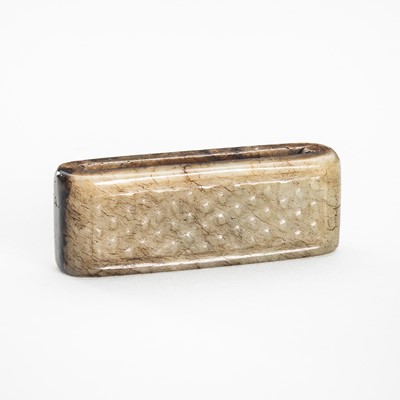 Lot 957 - A PALE CELADON AND BROWN JADE BELT SLIDE, QING DYNASTY