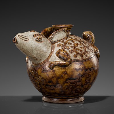 Lot 696 - A BROWN AND WHITE SLIP-GLAZED RABBIT-FORM POTTERY WATERPOT