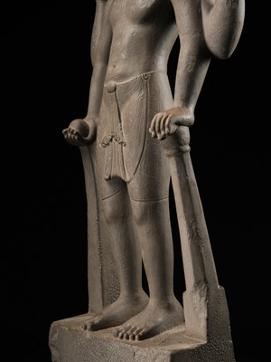 Lot 234 - AN IMPORTANT AND LARGE SANDSTONE FIGURE OF VISHNU, PRE-ANGKOR PERIOD, PHNOM DA STYLE