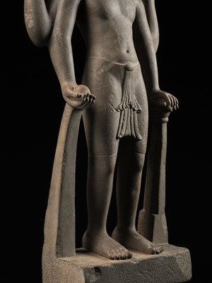 Lot 234 - AN IMPORTANT AND LARGE SANDSTONE FIGURE OF VISHNU, PRE-ANGKOR PERIOD, PHNOM DA STYLE