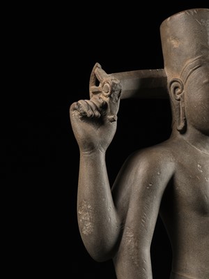 Lot 234 - AN IMPORTANT AND LARGE SANDSTONE FIGURE OF VISHNU, PRE-ANGKOR PERIOD, PHNOM DA STYLE