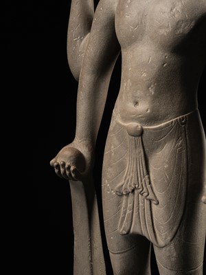 Lot 234 - AN IMPORTANT AND LARGE SANDSTONE FIGURE OF VISHNU, PRE-ANGKOR PERIOD, PHNOM DA STYLE