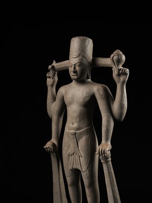 Lot 234 - AN IMPORTANT AND LARGE SANDSTONE FIGURE OF VISHNU, PRE-ANGKOR PERIOD, PHNOM DA STYLE