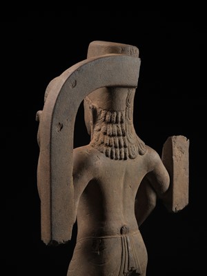 Lot 235 - A LARGE AND IMPRESSIVE SANDSTONE FIGURE OF HARIHARA, PRE-ANGKORIAN PERIOD, PHNOM DA STYLE