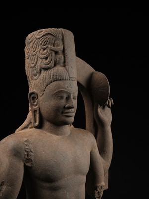 Lot 235 - A LARGE AND IMPRESSIVE SANDSTONE FIGURE OF HARIHARA, PRE-ANGKORIAN PERIOD, PHNOM DA STYLE