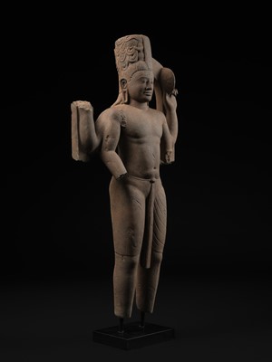 Lot 235 - A LARGE AND IMPRESSIVE SANDSTONE FIGURE OF HARIHARA, PRE-ANGKORIAN PERIOD, PHNOM DA STYLE