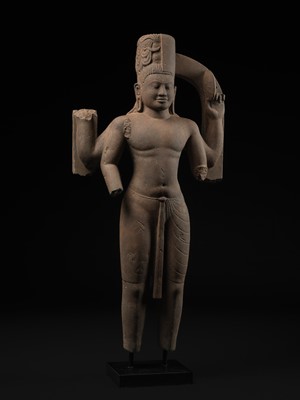 Lot 235 - A LARGE AND IMPRESSIVE SANDSTONE FIGURE OF HARIHARA, PRE-ANGKORIAN PERIOD, PHNOM DA STYLE