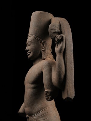 Lot 235 - A LARGE AND IMPRESSIVE SANDSTONE FIGURE OF HARIHARA, PRE-ANGKORIAN PERIOD, PHNOM DA STYLE