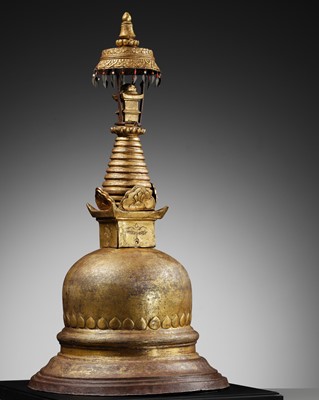 Lot 314 - A GILT COPPER ALLOY RELIQUARY STUPA, NEPAL, 17TH-18TH CENTURY