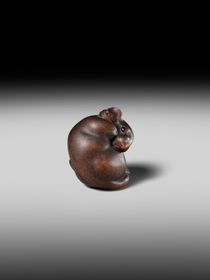 Lot 149 - MASAKAZU: A MASTERFUL WOOD NETSUKE OF A RAT GROOMING ITSELF