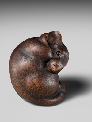 Lot 149 - MASAKAZU: A MASTERFUL WOOD NETSUKE OF A RAT GROOMING ITSELF