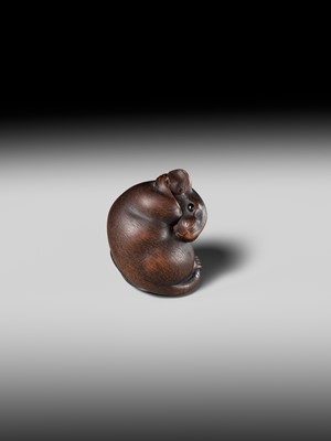 Lot 149 - MASAKAZU: A MASTERFUL WOOD NETSUKE OF A RAT GROOMING ITSELF