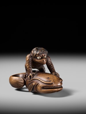 Lot 173 - ITTOKUSAI: A SUPERB WOOD NETSUKE OF A KAPPA AND NAMAZU (PARODY OF KADORI MYOJIN)