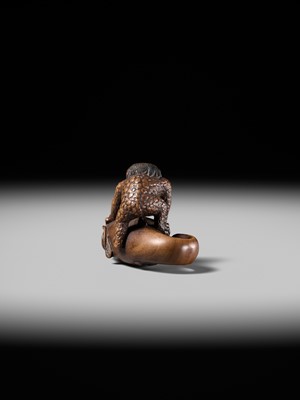 Lot 173 - ITTOKUSAI: A SUPERB WOOD NETSUKE OF A KAPPA AND NAMAZU (PARODY OF KADORI MYOJIN)