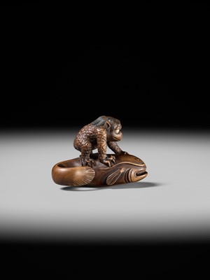 Lot 173 - ITTOKUSAI: A SUPERB WOOD NETSUKE OF A KAPPA AND NAMAZU (PARODY OF KADORI MYOJIN)