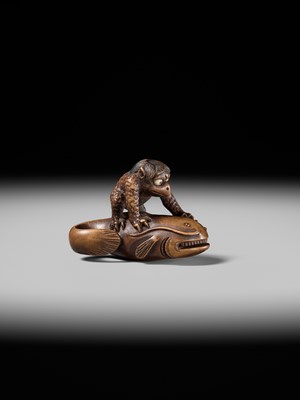 Lot 173 - ITTOKUSAI: A SUPERB WOOD NETSUKE OF A KAPPA AND NAMAZU (PARODY OF KADORI MYOJIN)