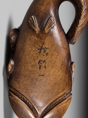 Lot 173 - ITTOKUSAI: A SUPERB WOOD NETSUKE OF A KAPPA AND NAMAZU (PARODY OF KADORI MYOJIN)