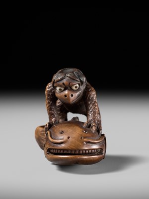 Lot 173 - ITTOKUSAI: A SUPERB WOOD NETSUKE OF A KAPPA AND NAMAZU (PARODY OF KADORI MYOJIN)