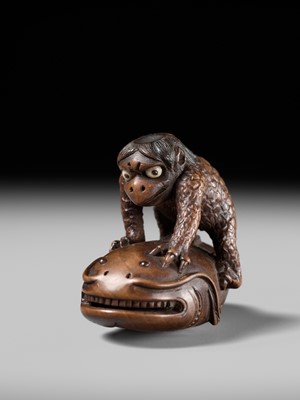 Lot 173 - ITTOKUSAI: A SUPERB WOOD NETSUKE OF A KAPPA AND NAMAZU (PARODY OF KADORI MYOJIN)