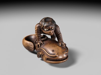 Lot 173 - ITTOKUSAI: A SUPERB WOOD NETSUKE OF A KAPPA AND NAMAZU (PARODY OF KADORI MYOJIN)