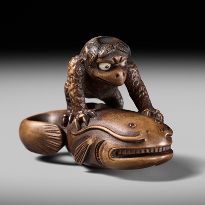 Lot 173 - ITTOKUSAI: A SUPERB WOOD NETSUKE OF A KAPPA AND NAMAZU (PARODY OF KADORI MYOJIN)