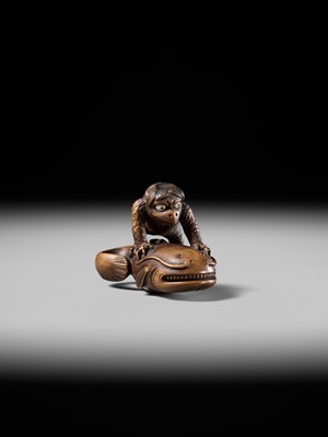 Lot 173 - ITTOKUSAI: A SUPERB WOOD NETSUKE OF A KAPPA AND NAMAZU (PARODY OF KADORI MYOJIN)