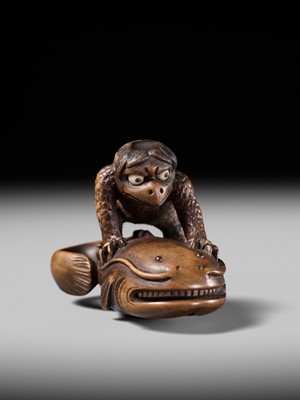 Lot 173 - ITTOKUSAI: A SUPERB WOOD NETSUKE OF A KAPPA AND NAMAZU (PARODY OF KADORI MYOJIN)