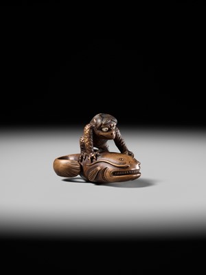 Lot 173 - ITTOKUSAI: A SUPERB WOOD NETSUKE OF A KAPPA AND NAMAZU (PARODY OF KADORI MYOJIN)