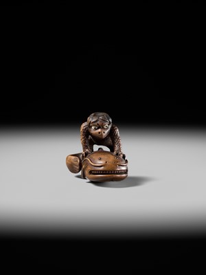 Lot 173 - ITTOKUSAI: A SUPERB WOOD NETSUKE OF A KAPPA AND NAMAZU (PARODY OF KADORI MYOJIN)