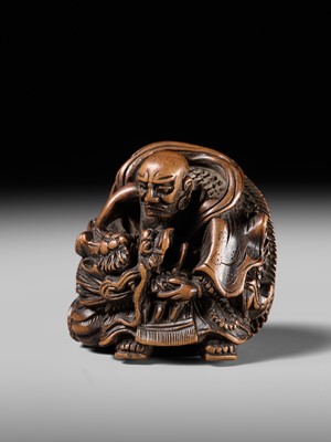 Lot 142 - MASATOMI: A RARE WOOD NETSUKE OF THE RAKAN HANDAKA SONJA AND HIS DRAGON