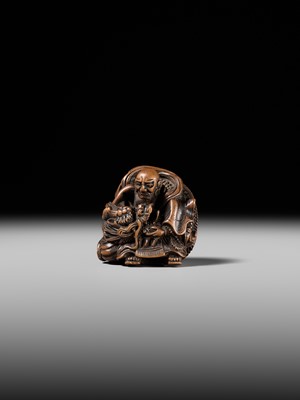 Lot 142 - MASATOMI: A RARE WOOD NETSUKE OF THE RAKAN HANDAKA SONJA AND HIS DRAGON