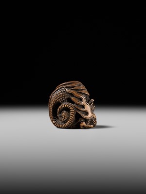 Lot 142 - MASATOMI: A RARE WOOD NETSUKE OF THE RAKAN HANDAKA SONJA AND HIS DRAGON