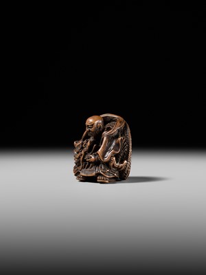 Lot 142 - MASATOMI: A RARE WOOD NETSUKE OF THE RAKAN HANDAKA SONJA AND HIS DRAGON