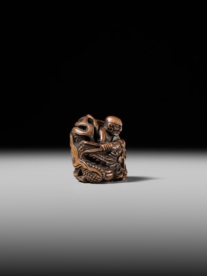 Lot 142 - MASATOMI: A RARE WOOD NETSUKE OF THE RAKAN HANDAKA SONJA AND HIS DRAGON