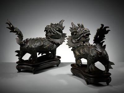 Lot 1570 - A PAIR OF HEAVY BRONZE FIGURES OF QILIN, MING DYNASTY