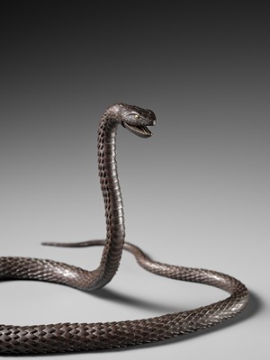 Lot 81 - MUNEYOSHI: A MASTERFUL AND LARGE IRON JIZAI OKIMONO OF A SNAKE