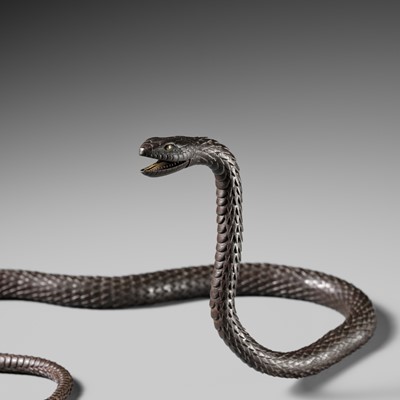 Lot 81 - MUNEYOSHI: A MASTERFUL AND LARGE IRON JIZAI OKIMONO OF A SNAKE