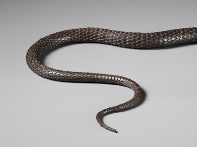 Lot 81 - MUNEYOSHI: A MASTERFUL AND LARGE IRON JIZAI OKIMONO OF A SNAKE