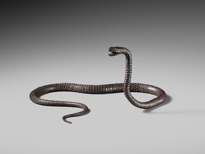 Lot 81 - MUNEYOSHI: A MASTERFUL AND LARGE IRON JIZAI OKIMONO OF A SNAKE