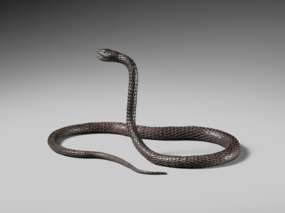 Lot 81 - MUNEYOSHI: A MASTERFUL AND LARGE IRON JIZAI OKIMONO OF A SNAKE