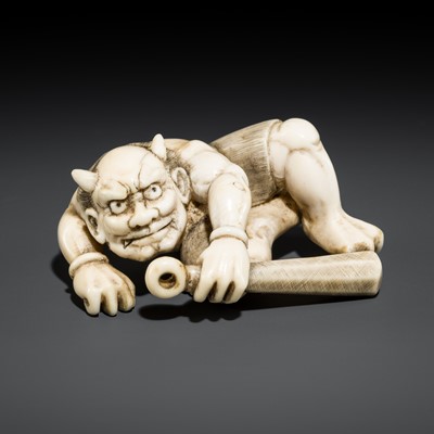 Lot 1278 - TOMOKAZU: AN IVORY NETSUKE OF AN ONI HOLDING A KANABO