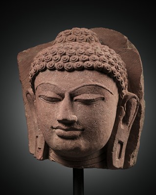 Lot 617 - A SANDSTONE HEAD OF BUDDHA, MATHURA, GUPTA PERIOD, 5TH-6TH CENTURY