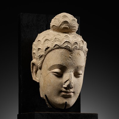 Lot 614 - A STUCCO HEAD OF BUDDHA, ANCIENT REGION OF GANDHARA, 3RD-4TH CENTURY